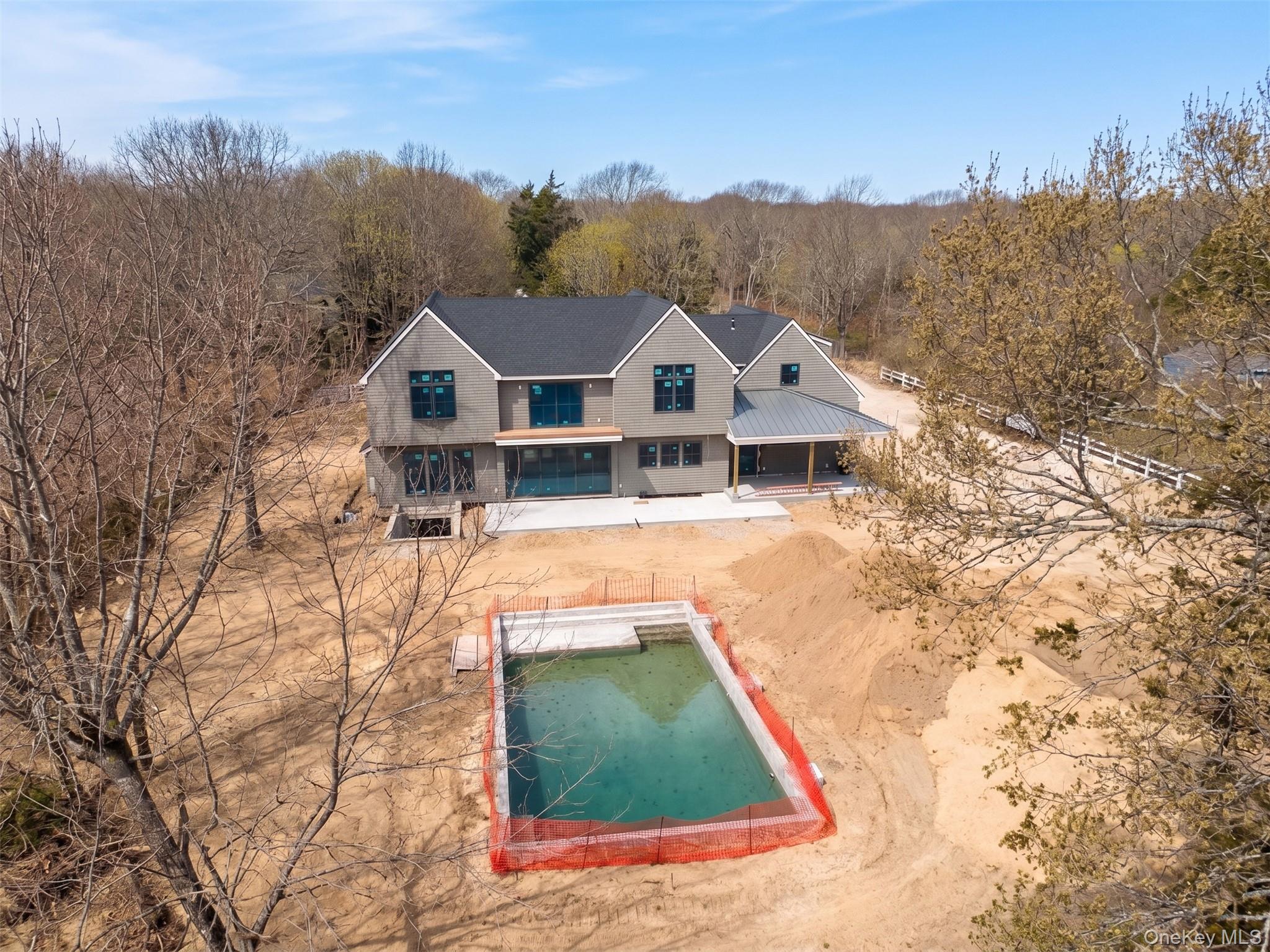 190 A South Country Road Remsenburg, NY 11960 - Photo 10 of 10 a view of a house with a yard