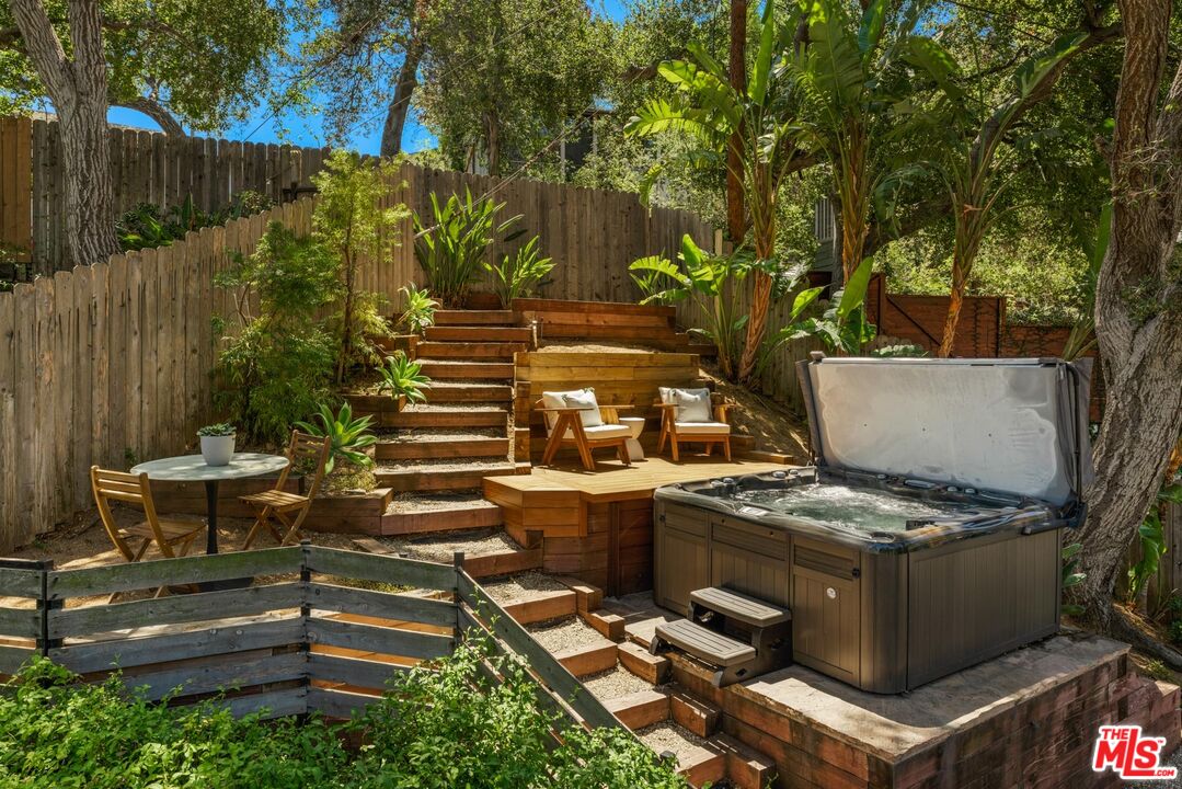 8326 Ridpath Drive Los Angeles, CA 90046 - Photo 22 of 25 a view of backyard with sitting area