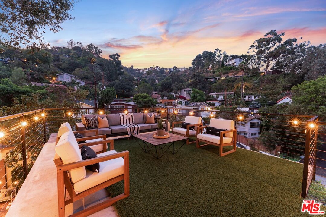 8326 Ridpath Drive Los Angeles, CA 90046 - Photo 23 of 25 a view of a terrace with sitting area