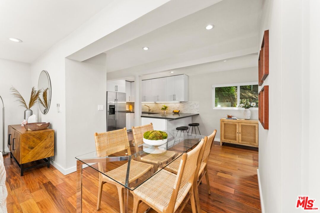 8326 Ridpath Drive Los Angeles, CA 90046 - Photo 6 of 25 a dining room with furniture and kitchen view