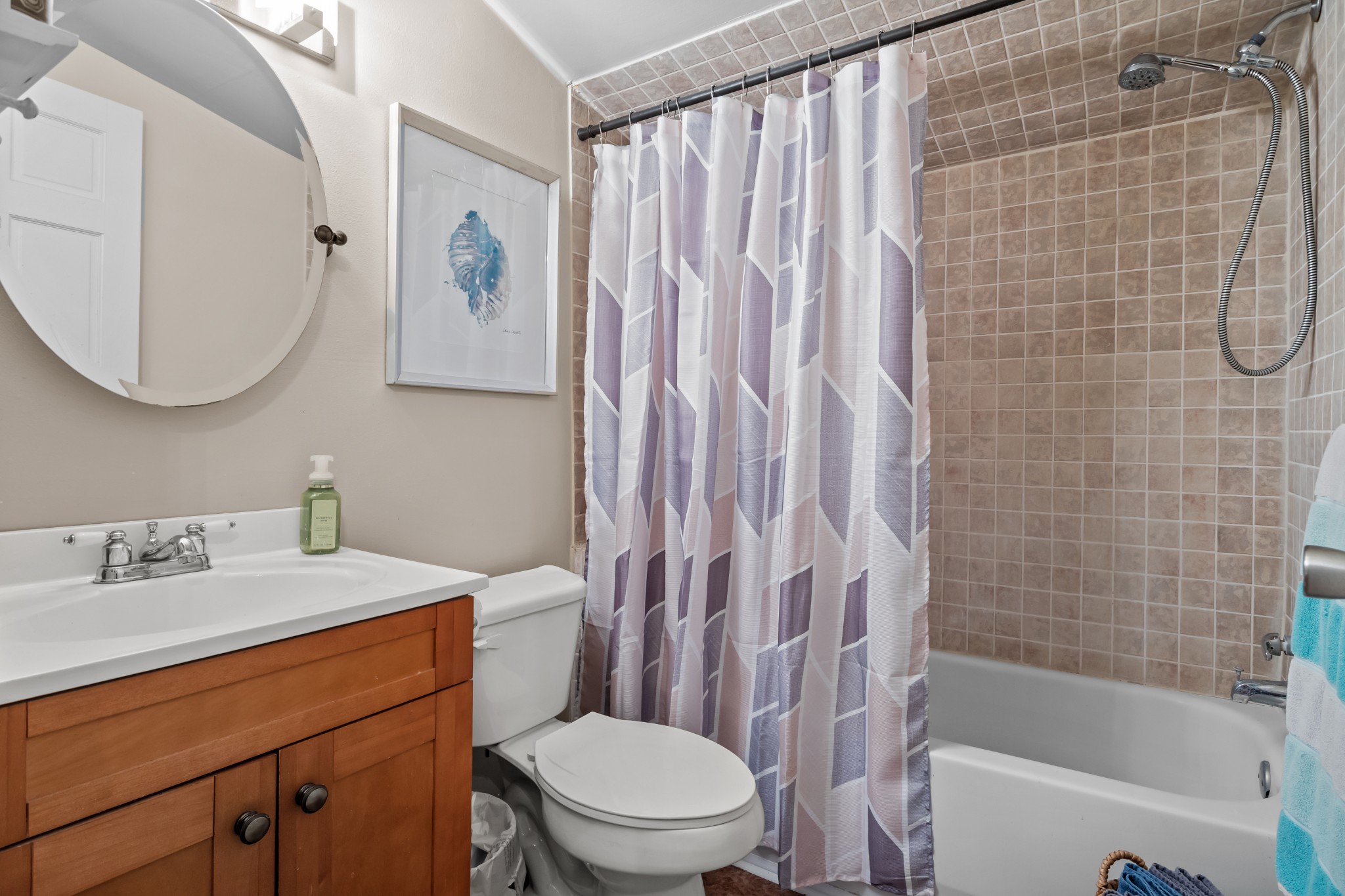 412 High Street Dickson, TN 37055 - Photo 30 of 42 a bathroom with a sink a toilet and a mirror