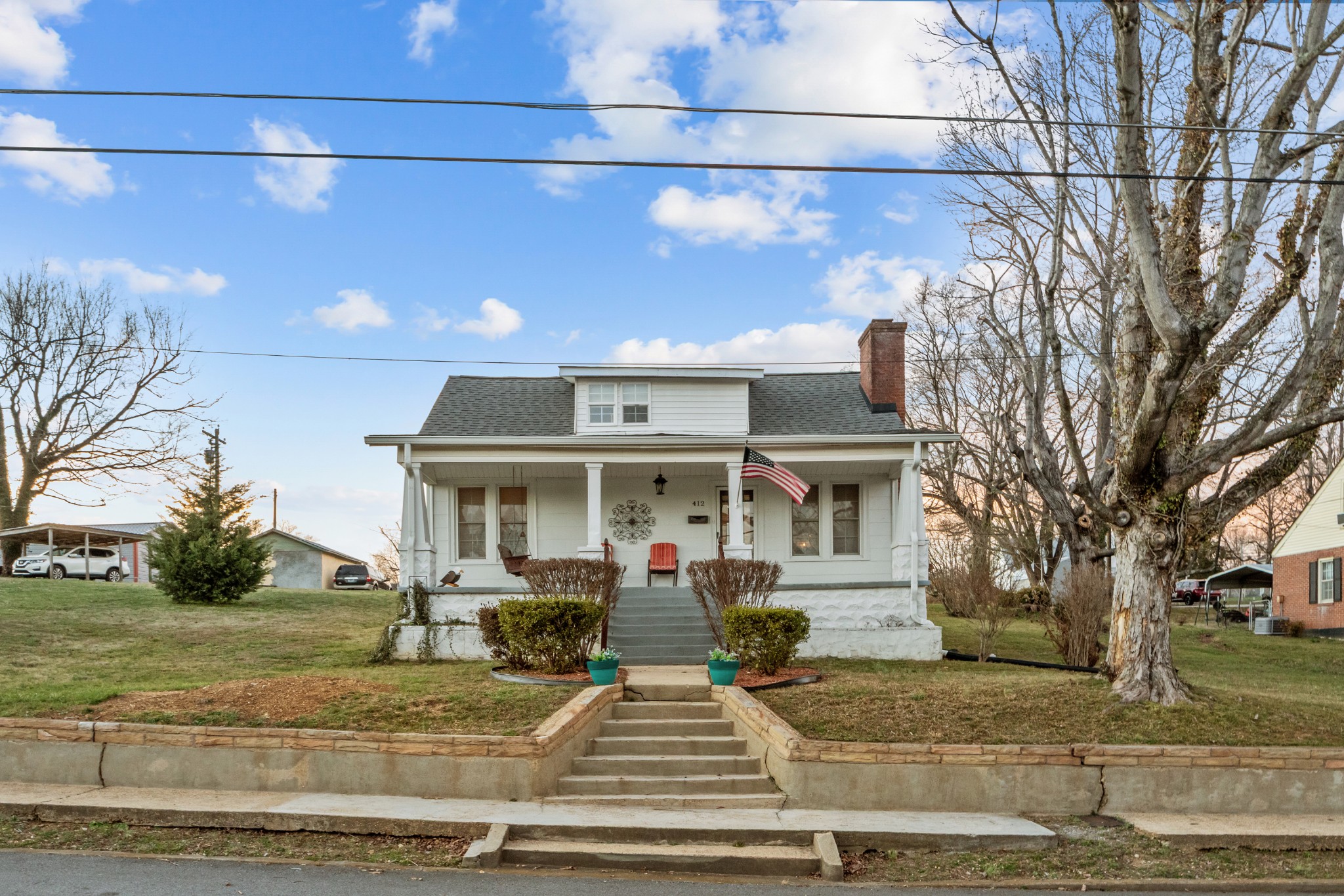412 High Street Dickson, TN 37055 - Photo 35 of 42 a front view of a house with garden