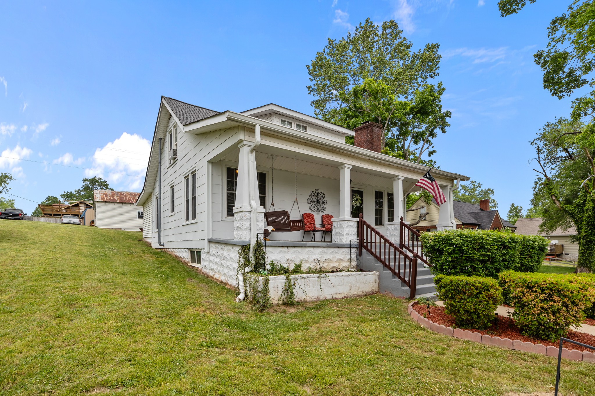 412 High Street Dickson, TN 37055 - Photo 39 of 42 a view of a house with a yard porch and sitting area