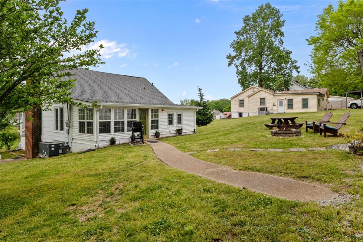 412 High Street Dickson, TN 37055 - Photo 41 of 42 a front view of a house with a garden