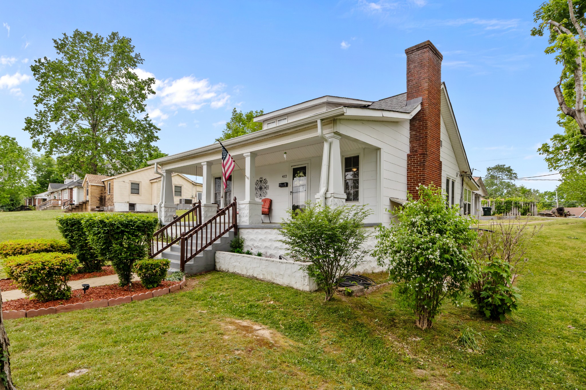 412 High Street Dickson, TN 37055 - Photo 5 of 42 a front view of a house with a yard