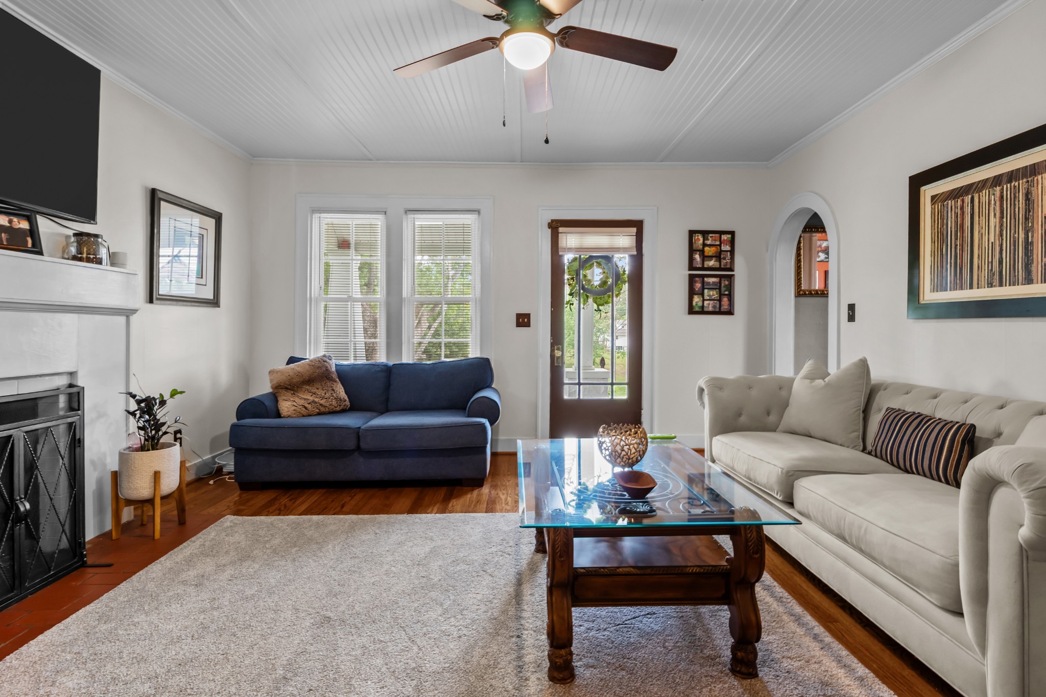 412 High Street Dickson, TN 37055 - Photo 9 of 42 a living room with furniture and a flat screen tv