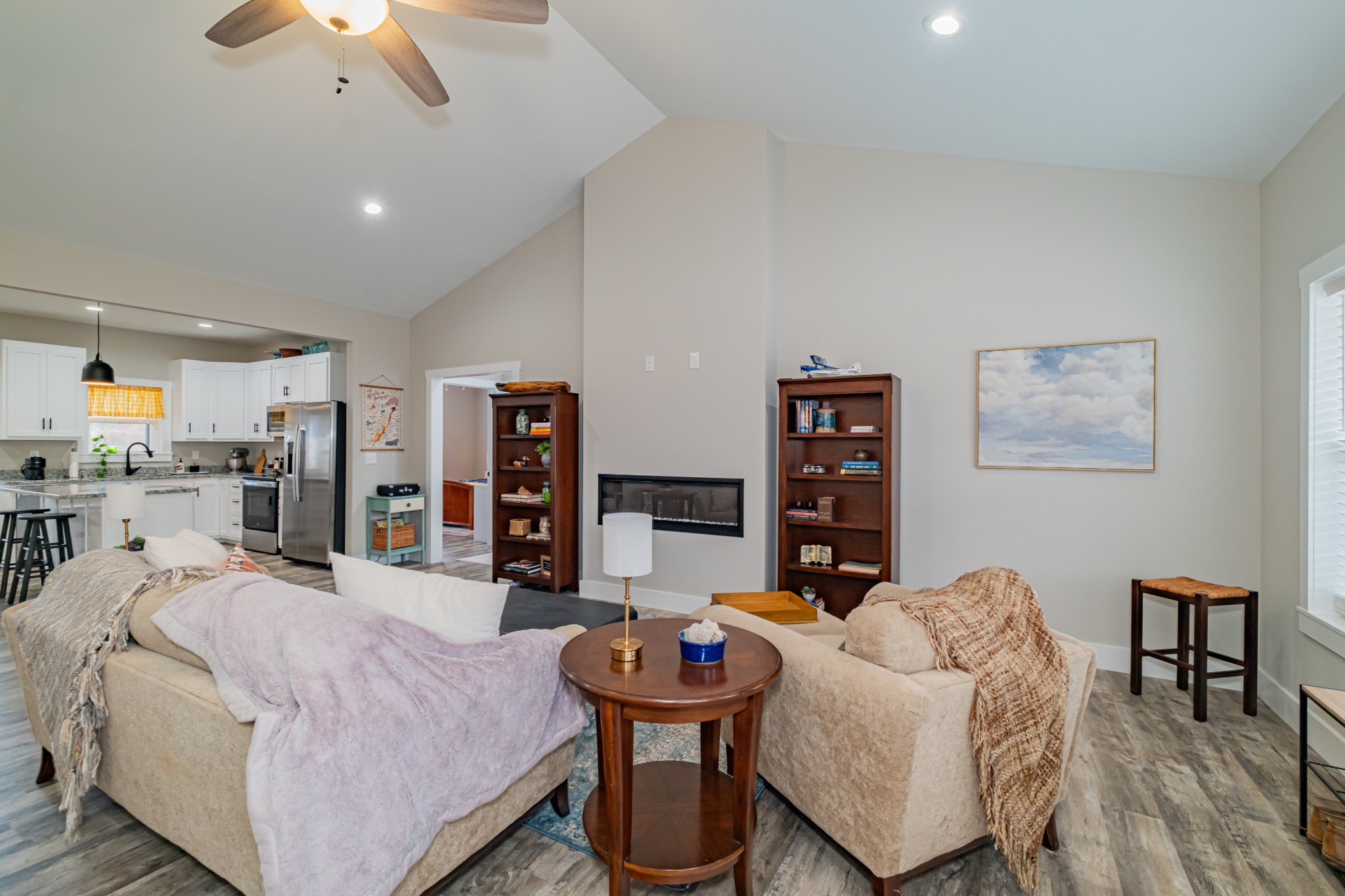 55 Rustling Pnes Road Dunlap, TN 37327 - Photo 10 of 33 a living room with fireplace furniture and wooden floor