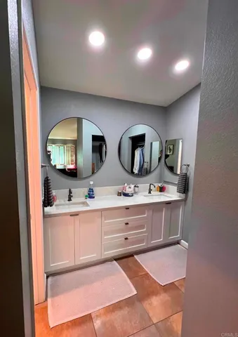 a view of living room with granite countertop furniture and mirror