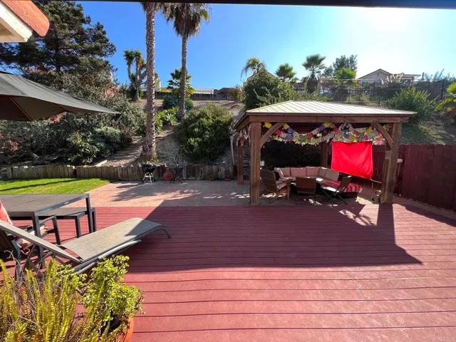 swimming pool view with a seating space