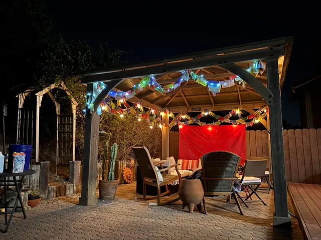 a view of swimming pool with a patio
