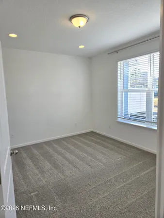 an empty room with a window