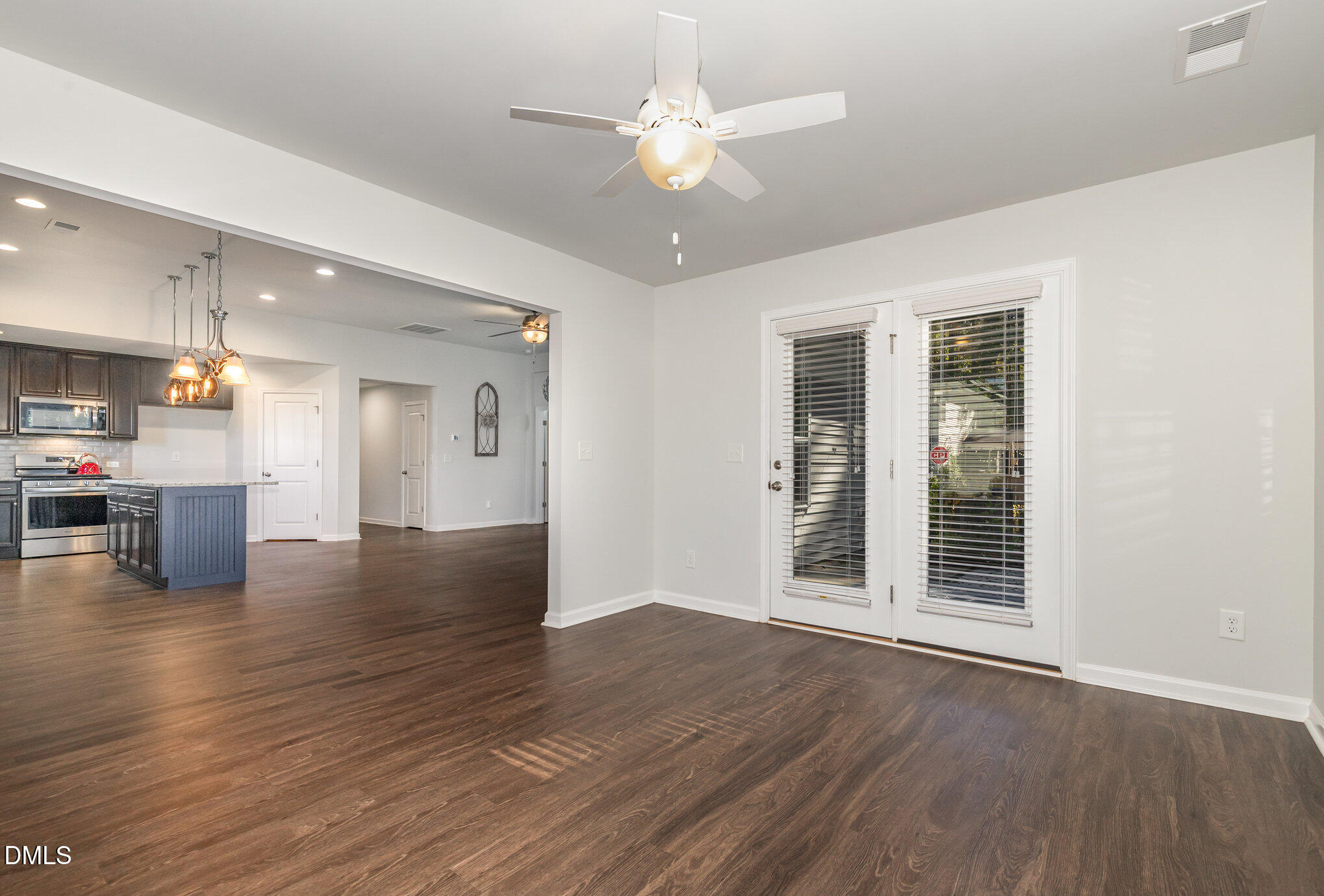 2634 Yellow Pine Road Raleigh, NC 27616 - Photo 16 of 39 Sunroom into dining and kitchen