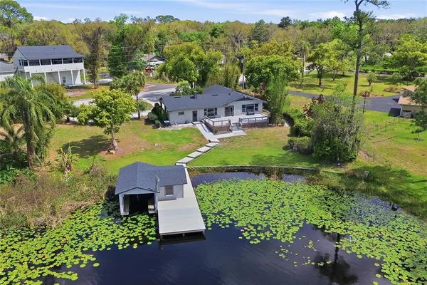 an aerial view of a house with a garden