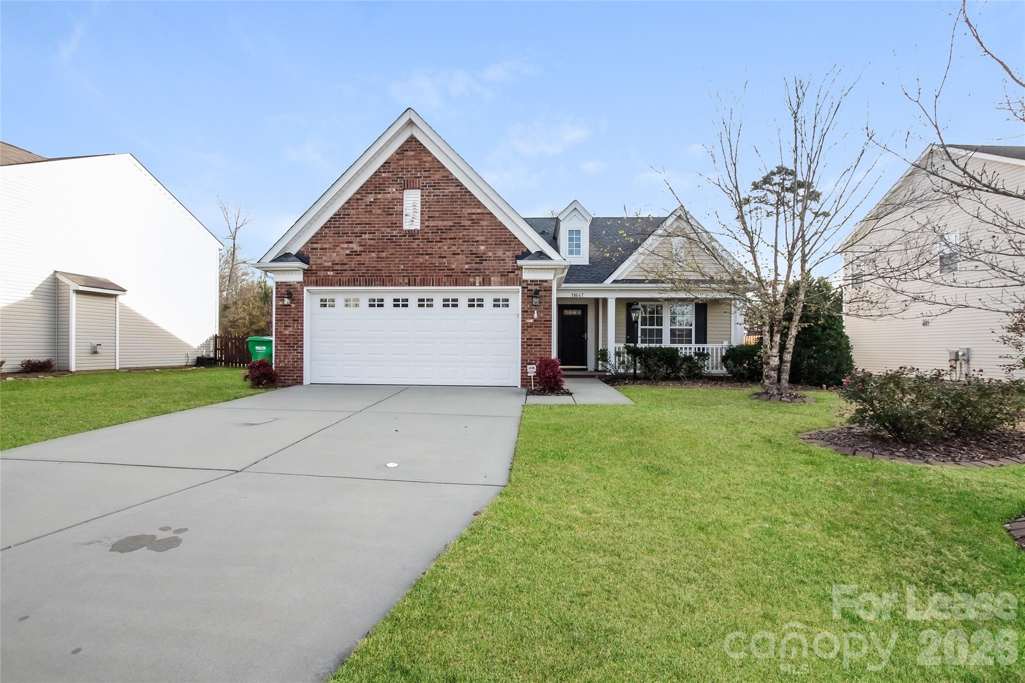a view of front a house with a yard