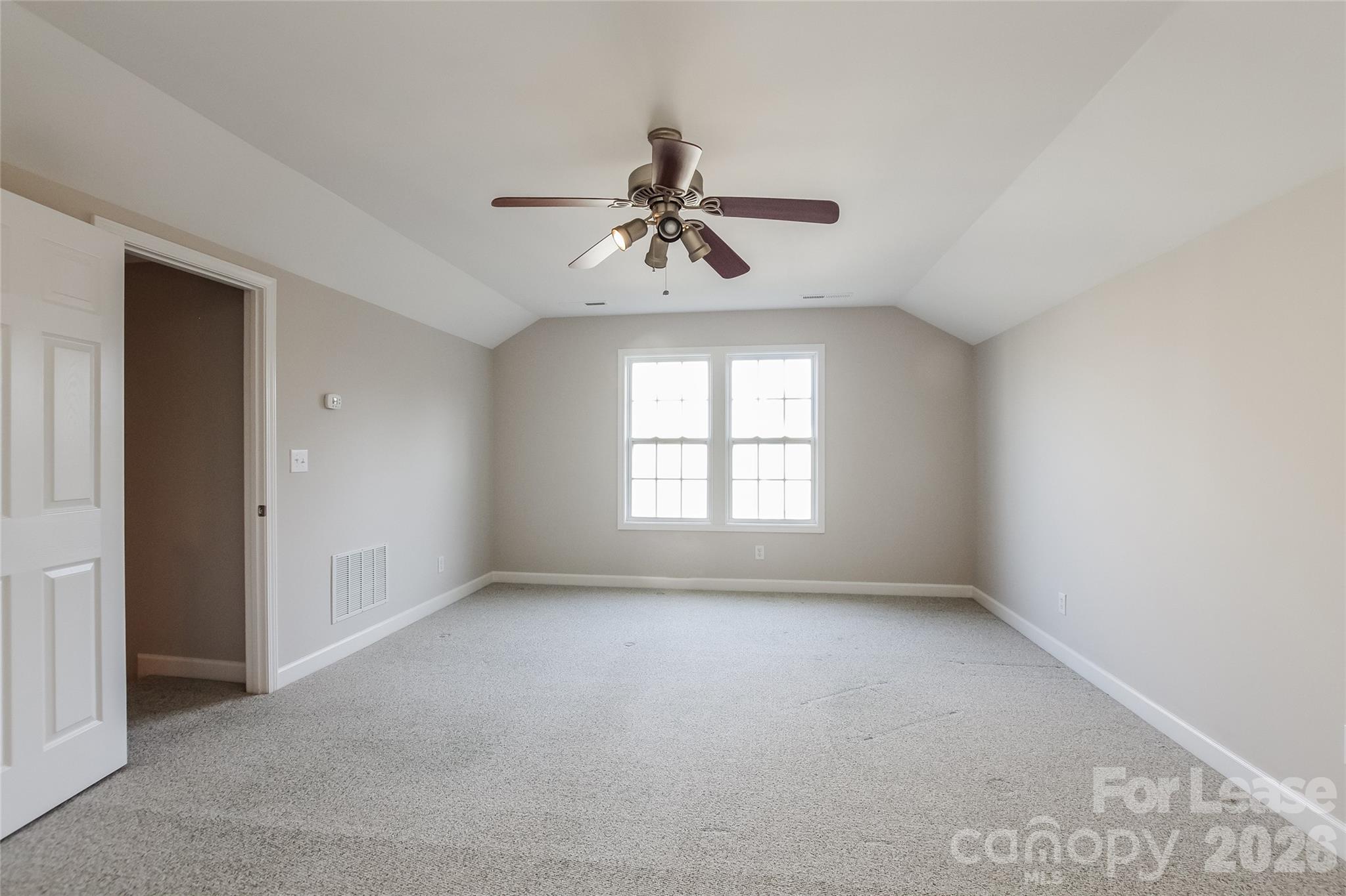 11647 Tucker Field Road Midland, NC 28107 - Photo 12 of 15 a view of an empty room with a window