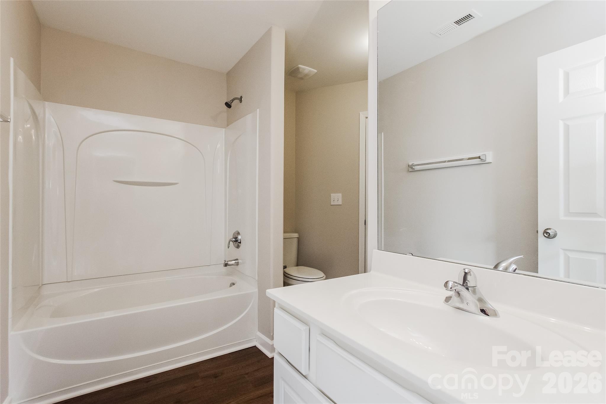 11647 Tucker Field Road Midland, NC 28107 - Photo 13 of 15 a bathroom with a bathtub and a sink