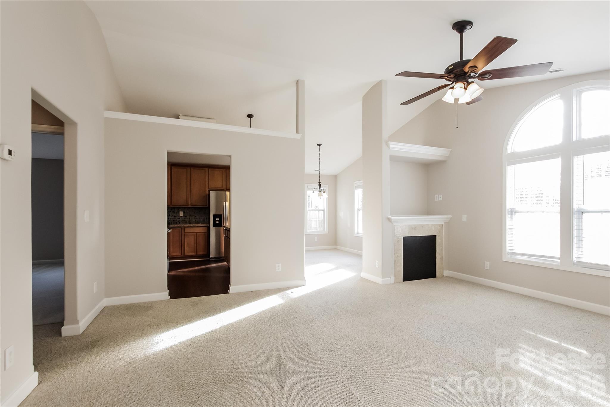 11647 Tucker Field Road Midland, NC 28107 - Photo 6 of 15 a view of an empty room with a fireplace