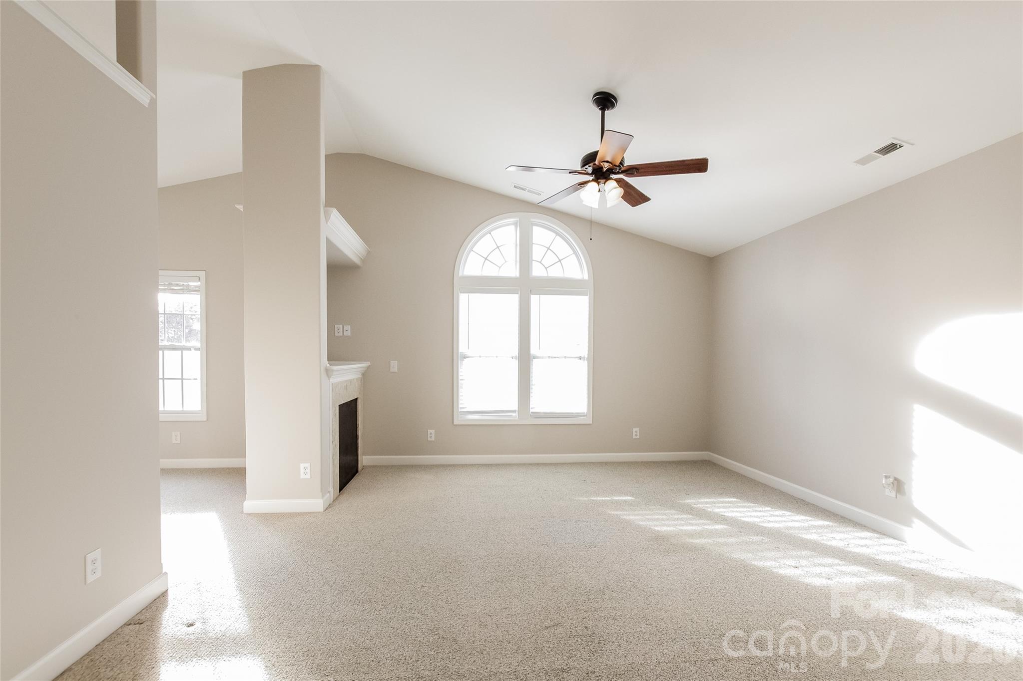 11647 Tucker Field Road Midland, NC 28107 - Photo 7 of 15 a view of empty room with windows