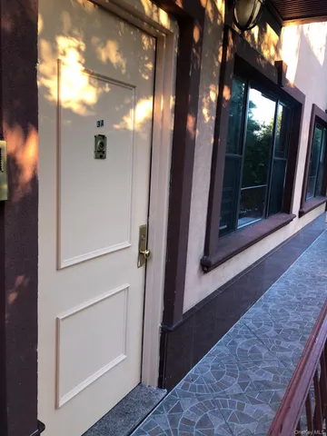 a front view of a building with glass windows