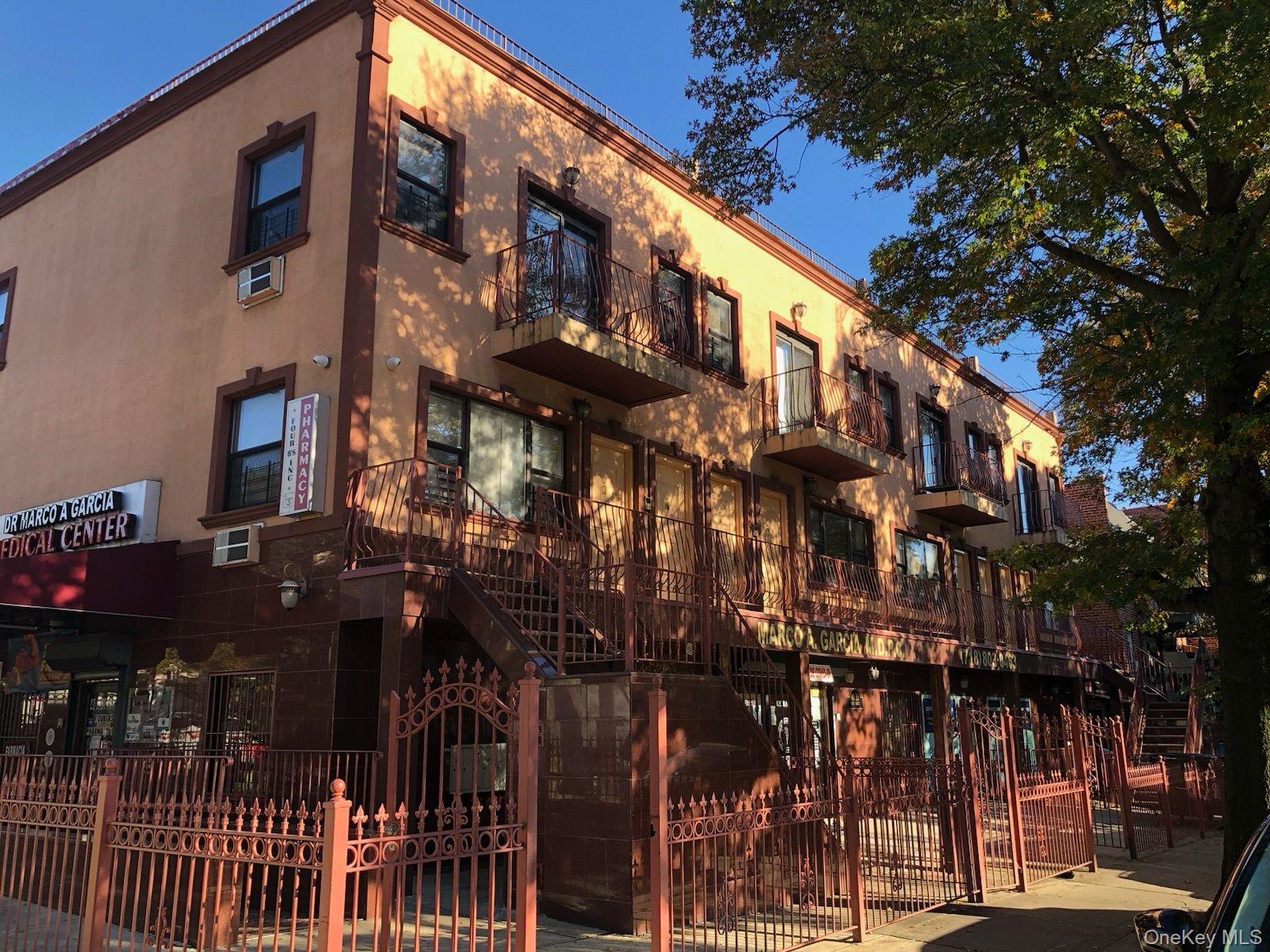 40-35 95th Street, Unit 2A Queens, NY 11373 - Photo 10 of 11 a view of a building with many windows