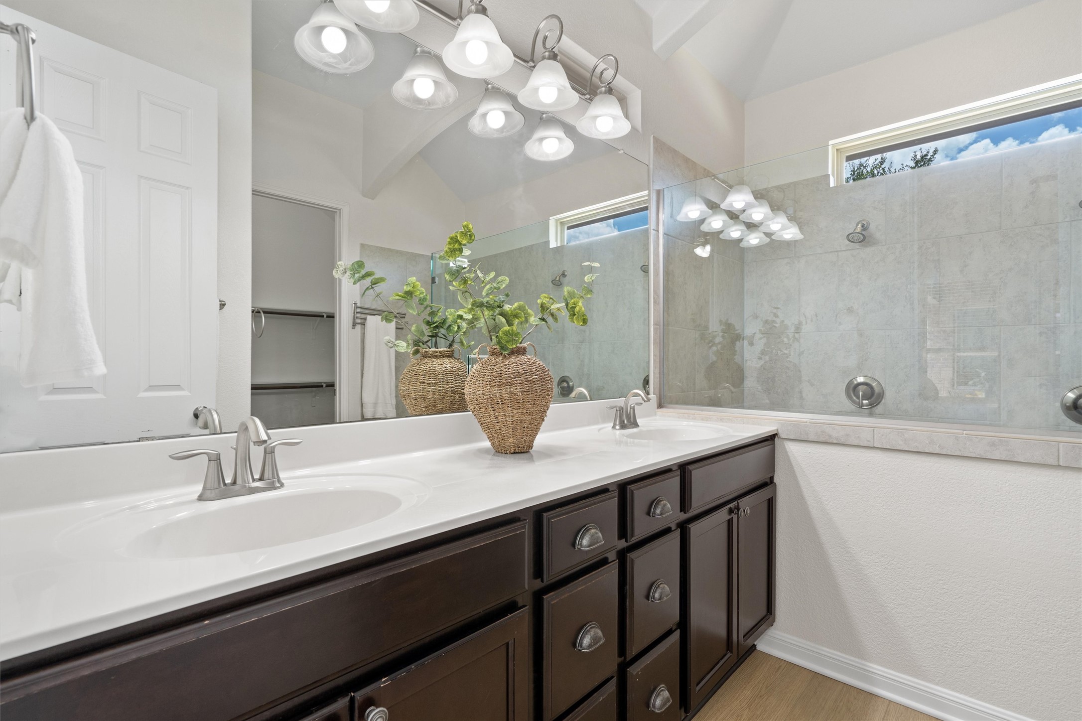 1128 Clearwing Circle Georgetown, TX 78626 - Photo 17 of 38 The primary bathroom offers a spa like feeling with oversized shower and dual sinks.