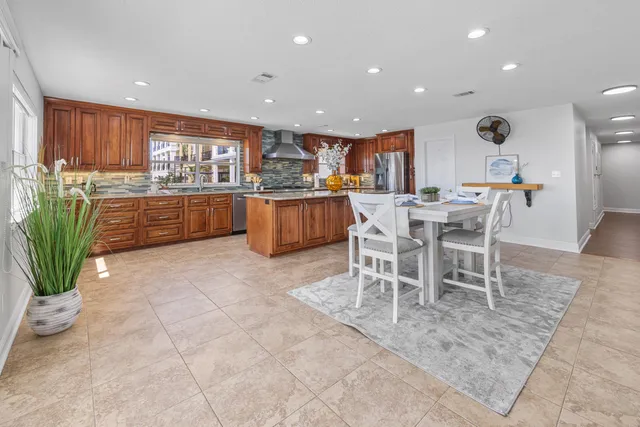 a bathroom with a toilet sink and a mirror