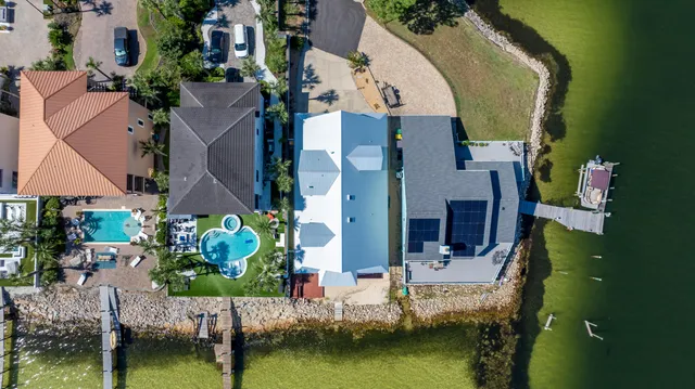 a kitchen with stainless steel appliances granite countertop a stove sink and cabinets