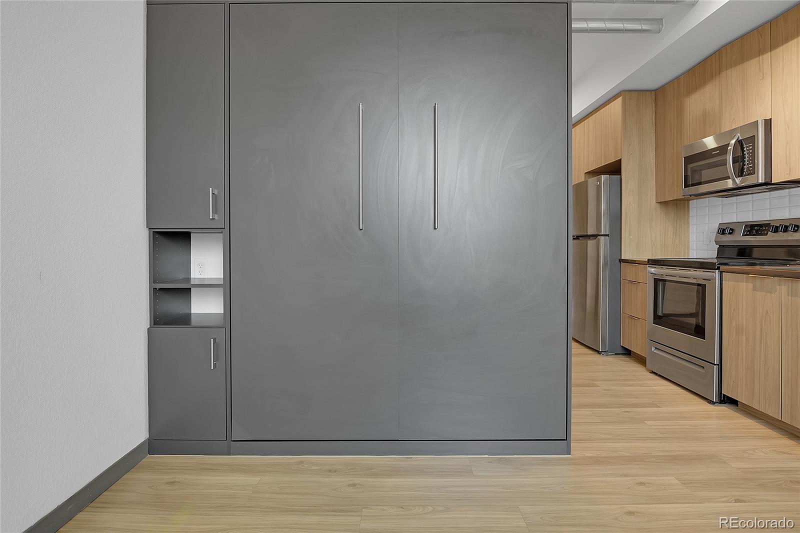 603 Inca Street, Unit 303 Denver, CO 80204 - Photo 11 of 15 a view of a kitchen from the hallway