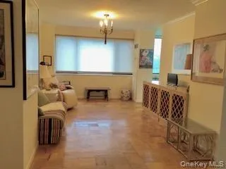 a bathroom with a sink mirror and tub