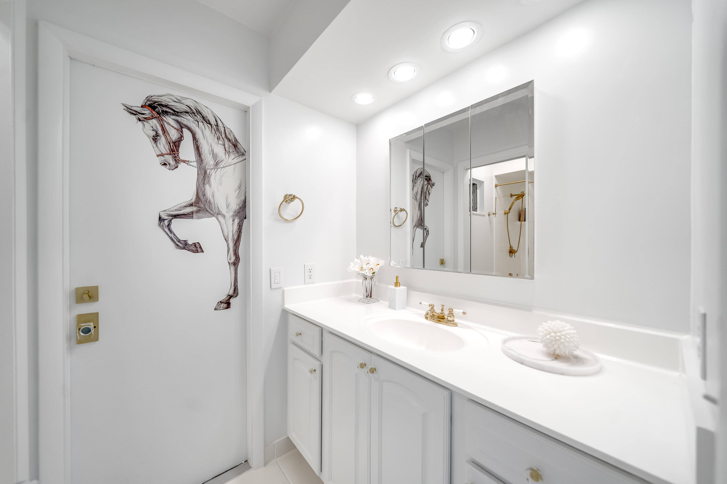 583 Rambling Dr Circle Wellington, FL 33414 - Photo 14 of 40 a bathroom with a sink vanity and a mirror
