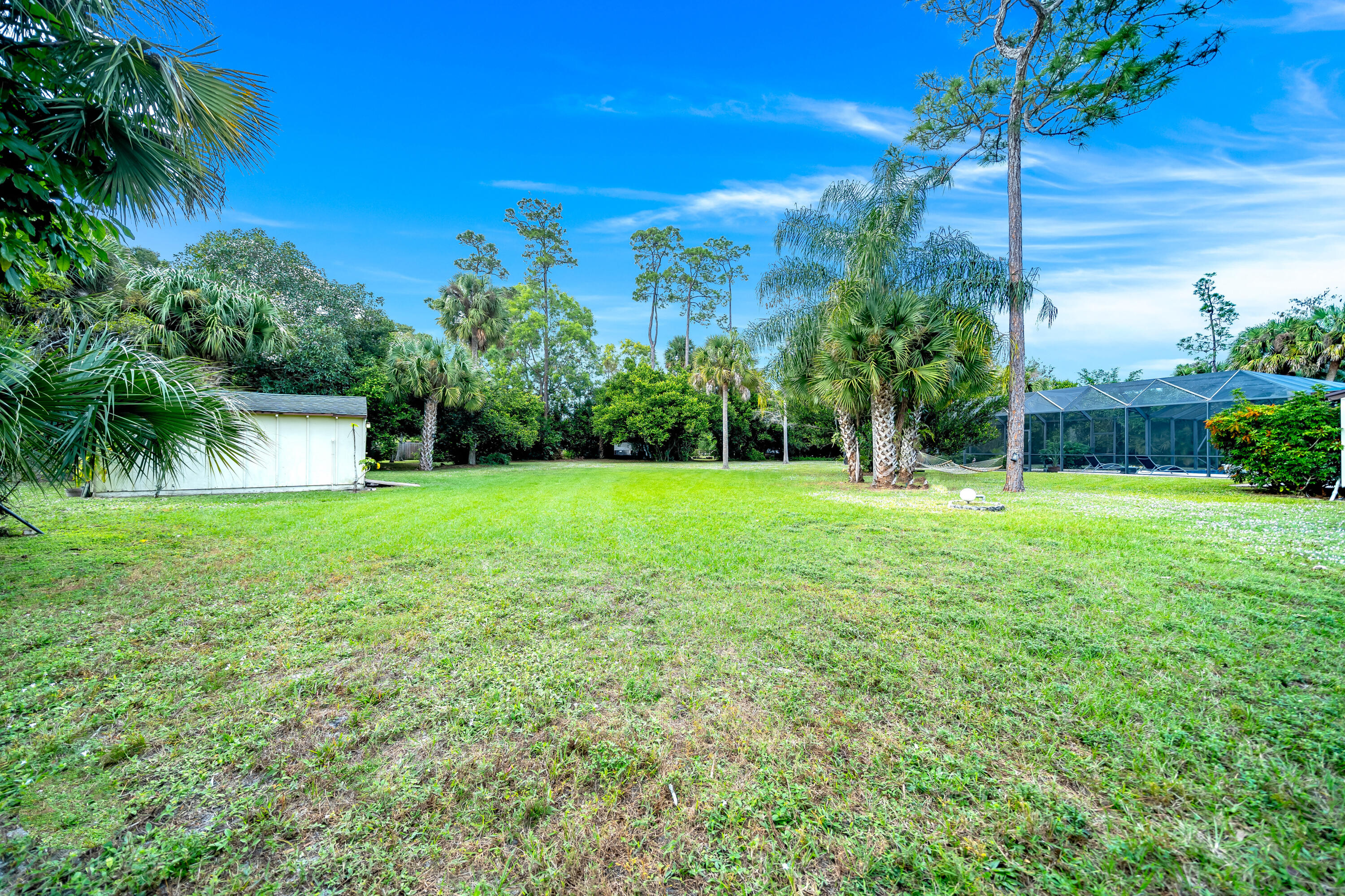 583 Rambling Dr Circle Wellington, FL 33414 - Photo 33 of 40 a view of a house with a yard