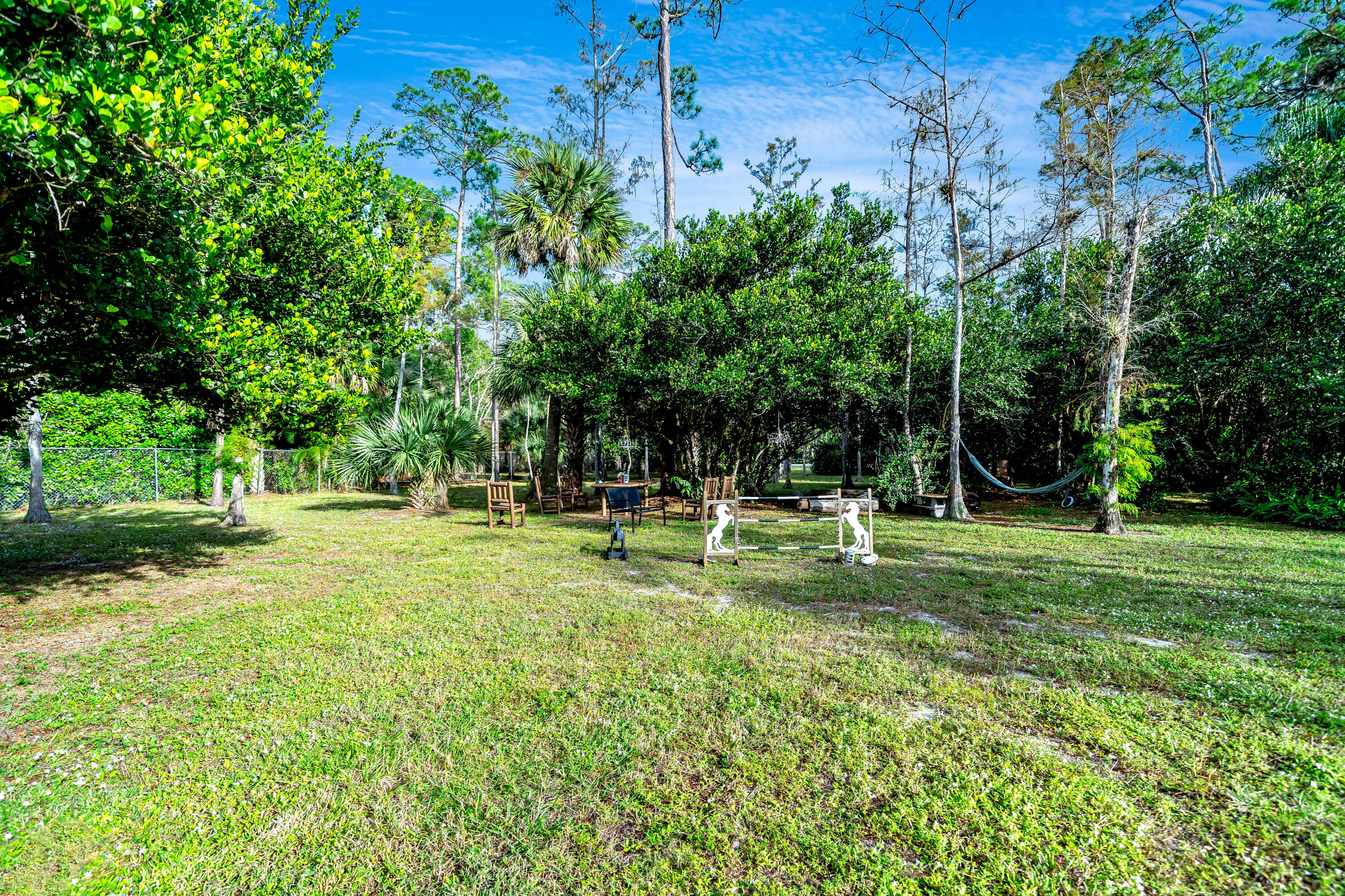 583 Rambling Dr Circle Wellington, FL 33414 - Photo 34 of 40 a view of a park with a tree