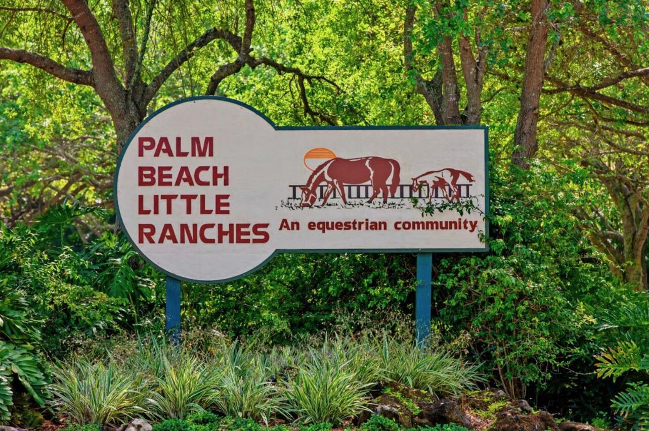 583 Rambling Dr Circle Wellington, FL 33414 - Photo 38 of 40 a sign that is on a pole