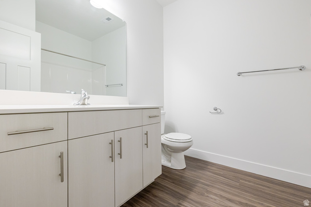 709 West 4500th South, Unit N301 Mapleton, UT 84664 - Photo 8 of 17 Full bathroom with vanity and dark wood finished floors
