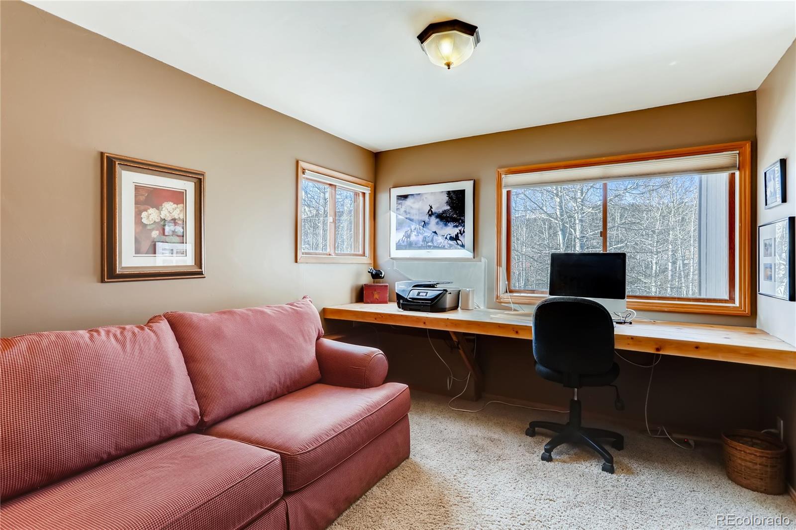 193 Twilight Terrace Drive Bailey, CO 80421 - Photo 14 of 34 a livingroom with workspace couch and a window