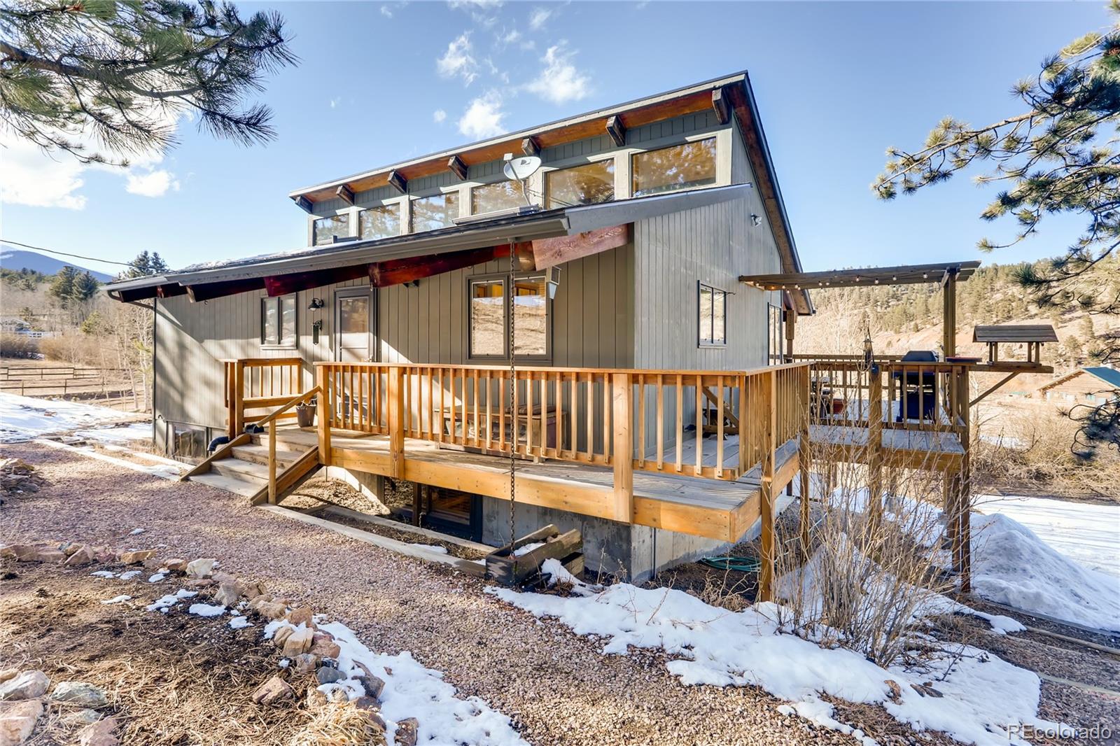 193 Twilight Terrace Drive Bailey, CO 80421 - Photo 27 of 34 a view of a house with backyard and sitting area