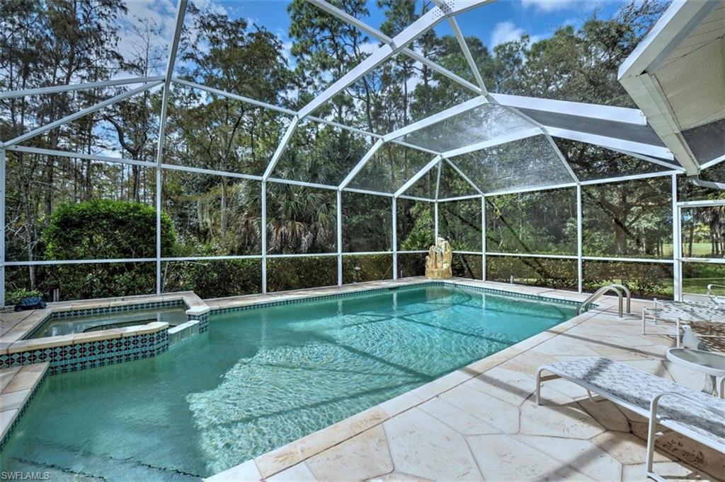 8023 Kilkenny Way, Unit G31 Naples, FL 34112 - Photo 2 of 2 a view of yard with tennis court