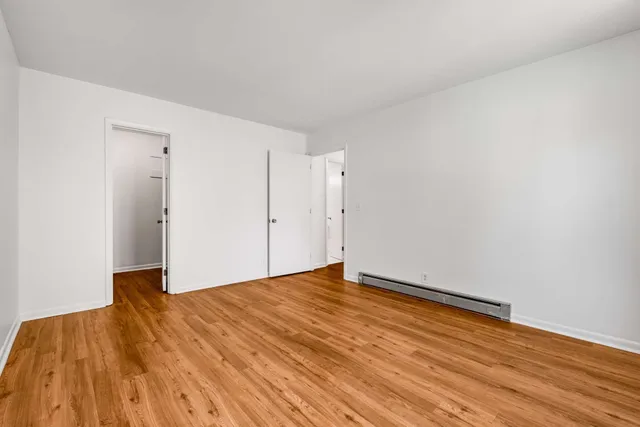 a bathroom with a sink vanity toilet and shower