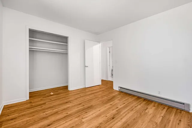 a view of a swimming pool with a lounge chair