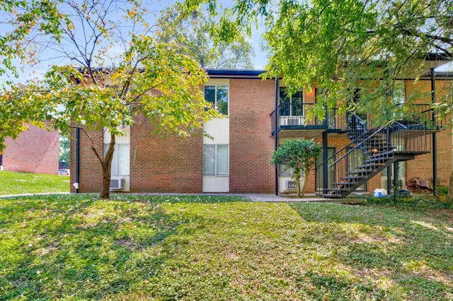 a view of balcony with a floor to ceiling window