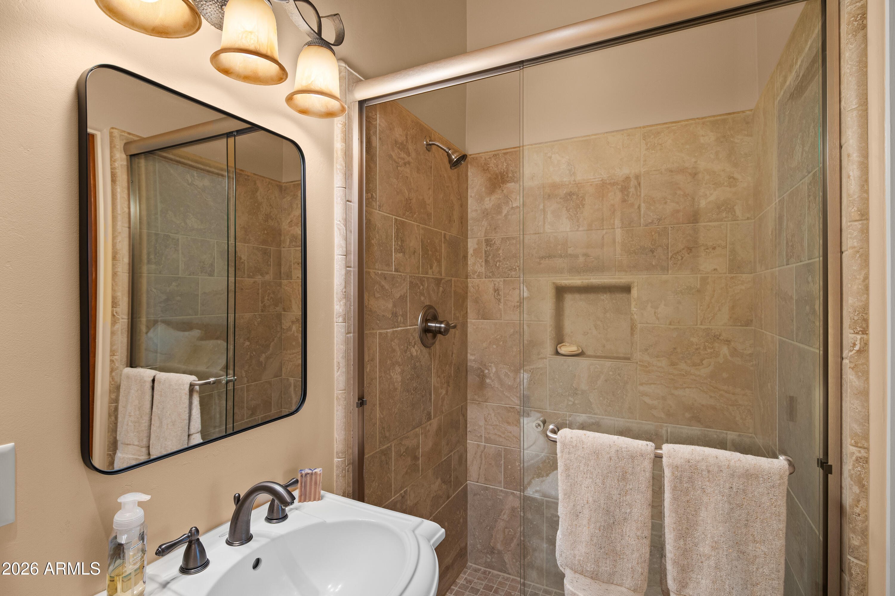190 Morgan Road Sedona, AZ 86336 - Photo 50 of 51 a bathroom with a sink and shower