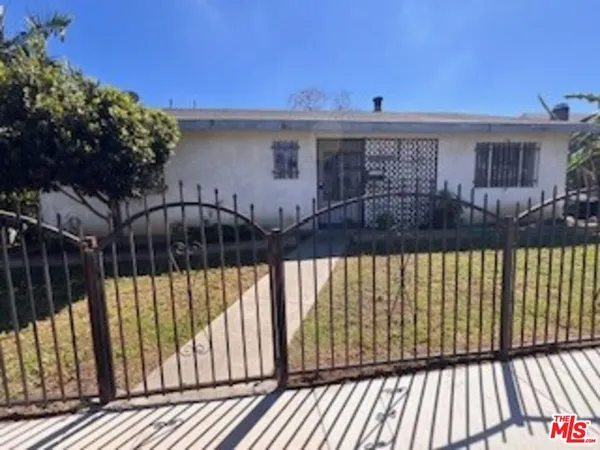 a front view of a house with a balcony