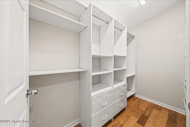 a workspace with furniture and wooden floor