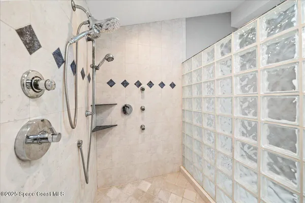 a bathroom with a tub and sink