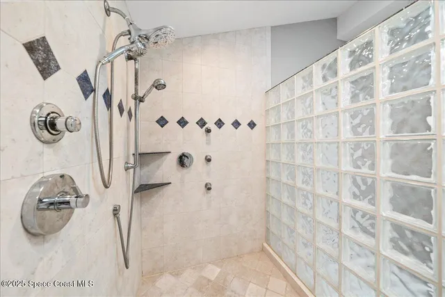 a bathroom with a tub and sink