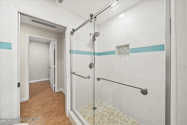 an aerial view of a golf course with parking space