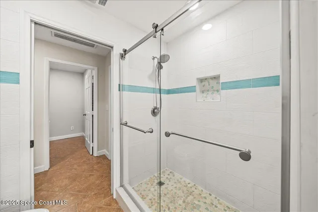 an aerial view of a golf course with parking space