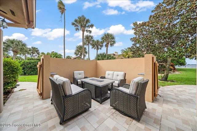 an aerial view of a house with a garden