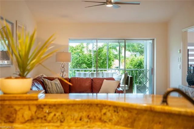 a view of a swimming pool with seating area