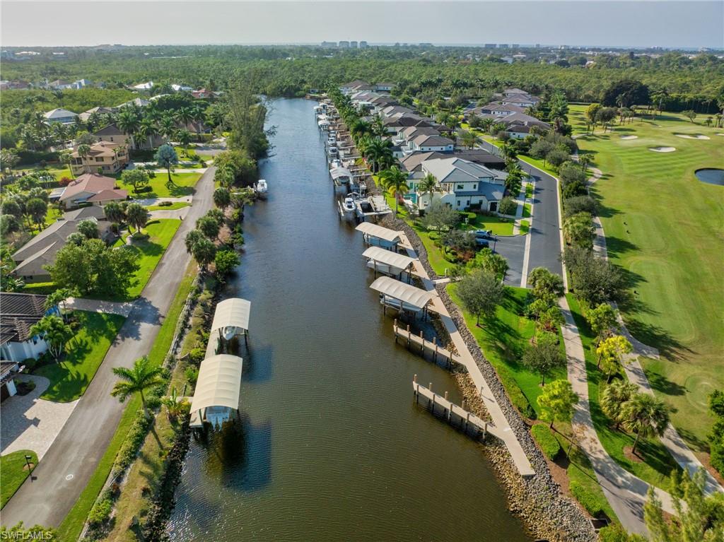 1671 Vinland Way Naples, FL 34105 - Photo 29 of 50 an aerial view of residential houses with outdoor space and lake view